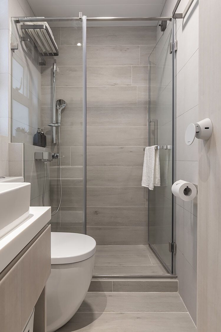 Sleek walk-in shower tile finishing