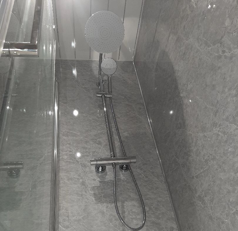 Walk-in shower enclosure before and after handover